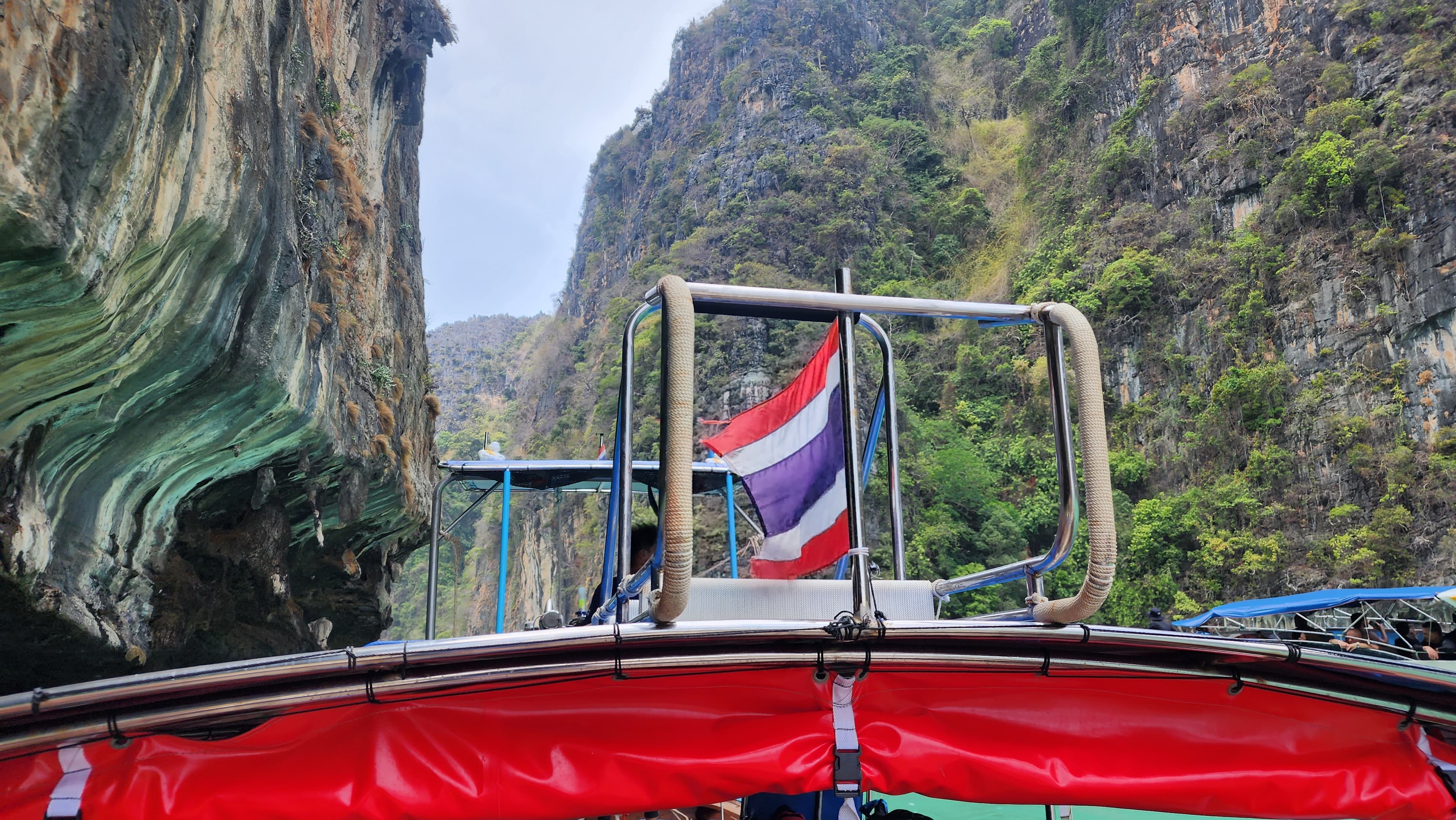 Phi Phi Islands Private Longtail Boat Tour - thailand flag on five star group longtail boat